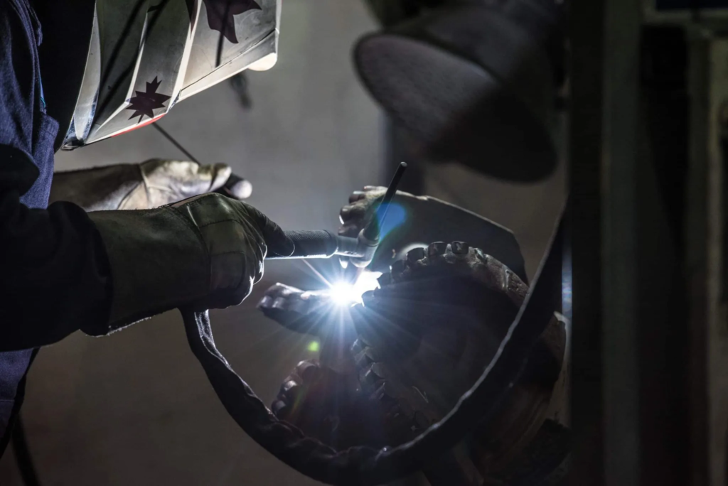 Welding and manufacturing of steel body PDC bits
